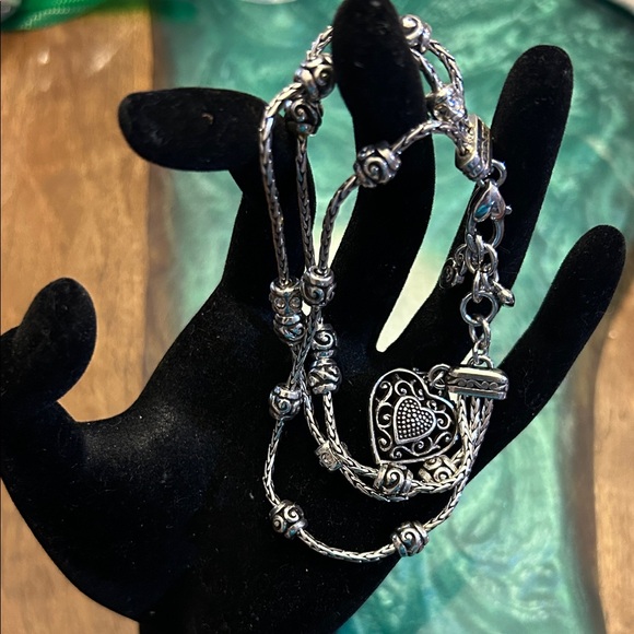 Brighton Jewelry - Brighton Reno Heart Bracelet features a silver-plated triple chain design, EUC